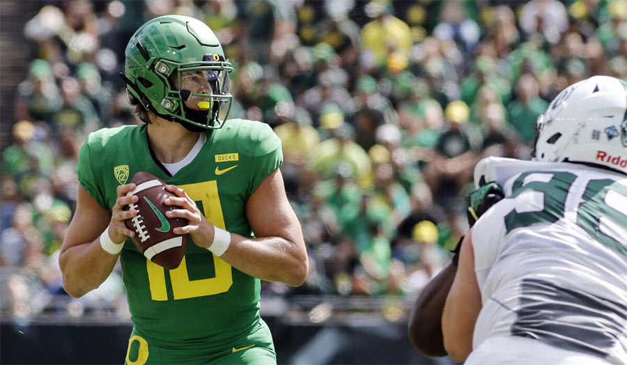 Justin Herbert in Oregon football jersey