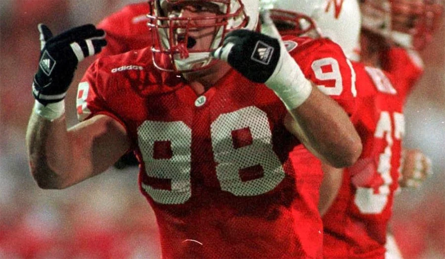 Grant Wistrom pass rushing for Nebraska