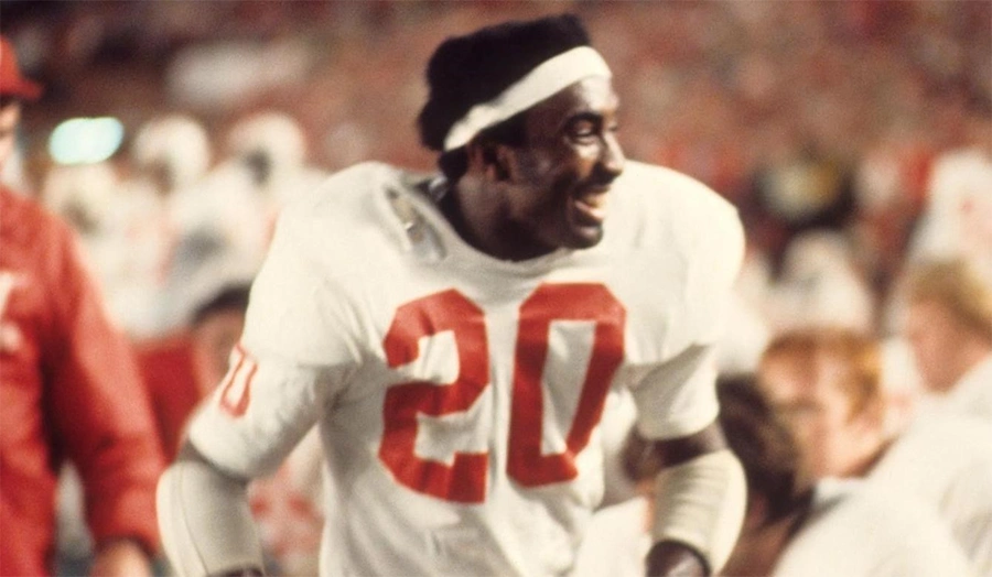 Johnny Rodgers returning a kick in Nebraska colors