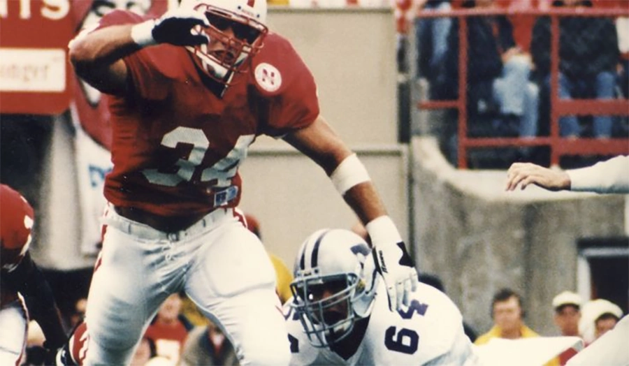 Trev Alberts linebacker Nebraska making a play